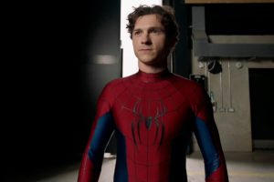 Tom Holland as Spider-Man in suit preparing for a new adventure in upcoming movie